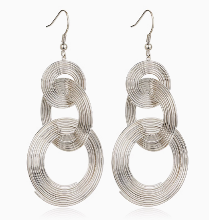 Long and large circular earrings